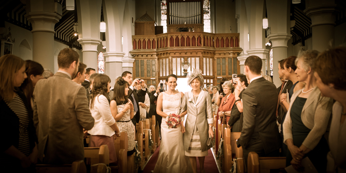 mother giving daughter away on wedding day
